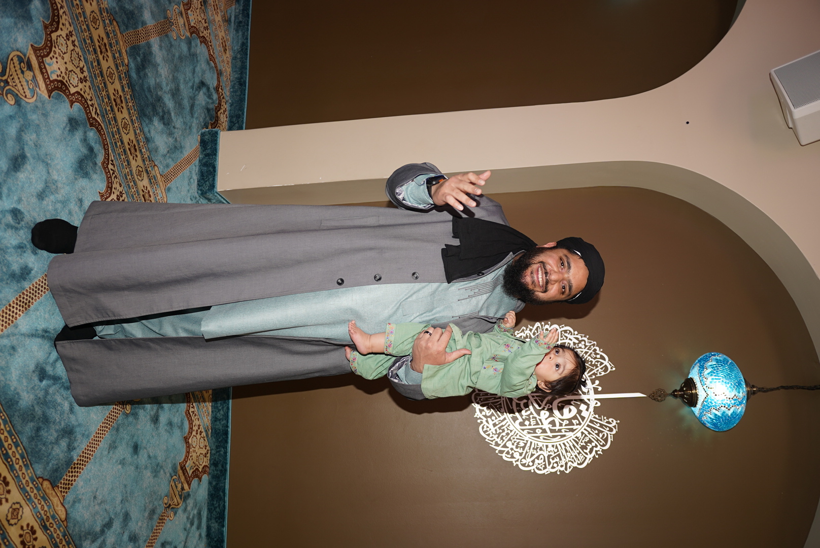 Haris at the mosque with his daughter